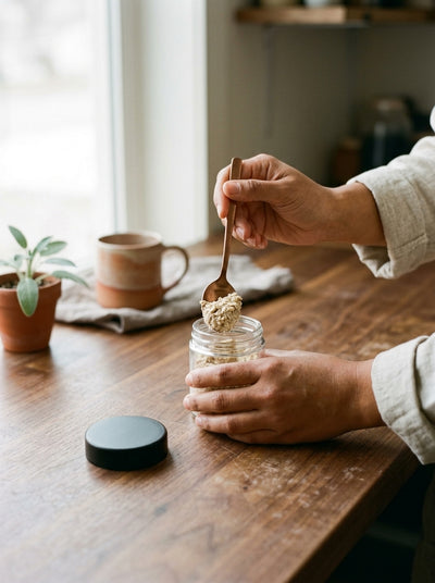 3oz Glass Jar with Black CR Lid — in use on a craft bench