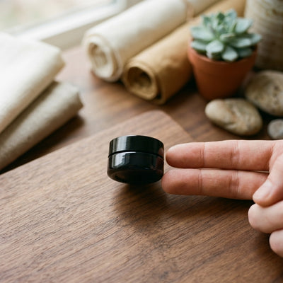 5ml UV Resistant Round Bottom Jar with Child Resistant Black Lids — size reference