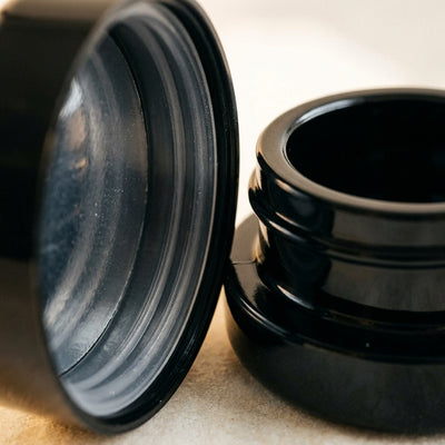 7ml UV Resistant Round Bottom Jar with Child Resistant Black Lids — material and finish detail