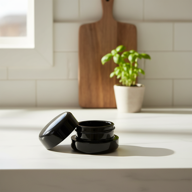 7ml UV Resistant Round Bottom Jar with Child Resistant Black Lids - Kitchen Lifestyle