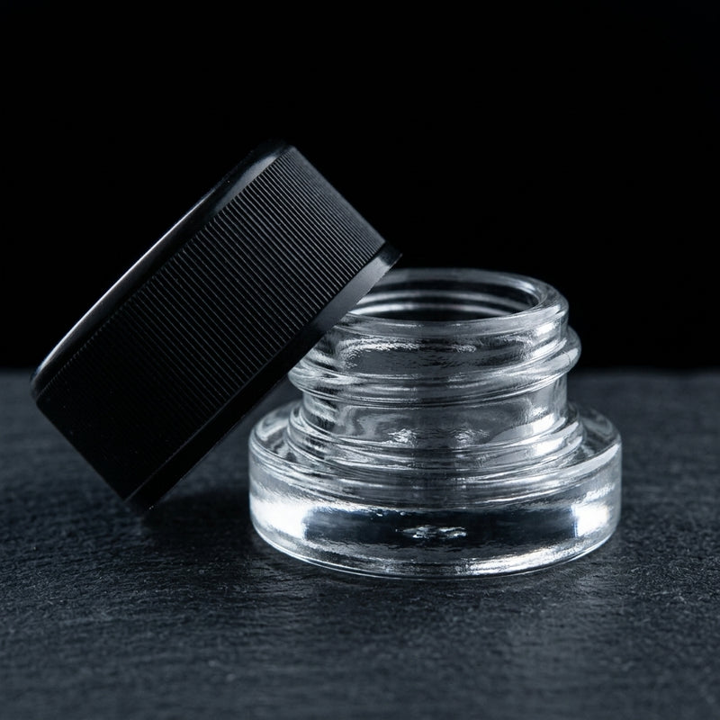 5ml Child Resistant Jar with ribbed black lid, editorial product shot