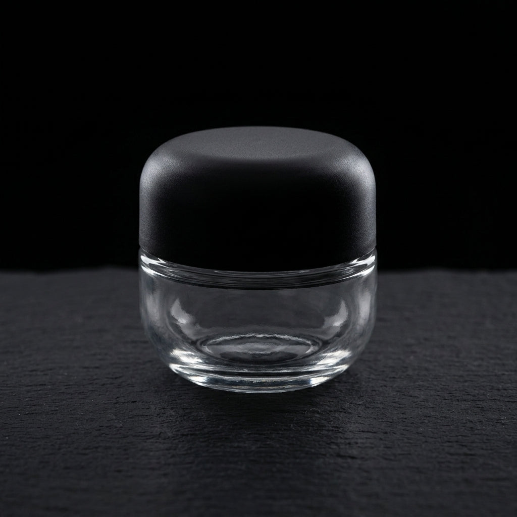 5ml Round Bottom Child Resistant Jar with domed black lid, editorial product shot