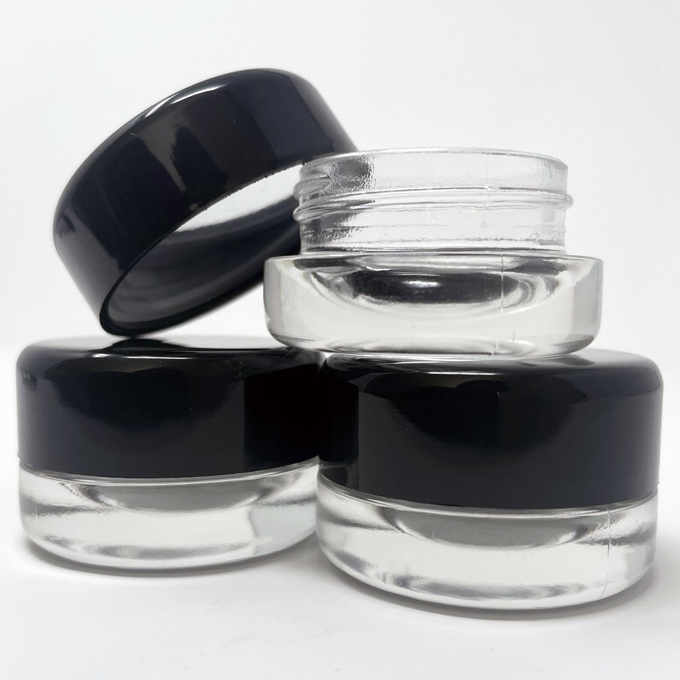 https://kraftandkitchen.com/cdn/shop/products/9ml-round-bottom-child-resistant-glass-jar-with-lids-615688_1600x.jpg?v=1630381384